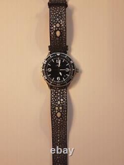 Sinn model 657 watch with 3 bands, steel, leather and custom Stingray band