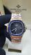 Vintage Patek Philippe Automatic Blue Bezel Stainless Steel Men's Wrist Watch